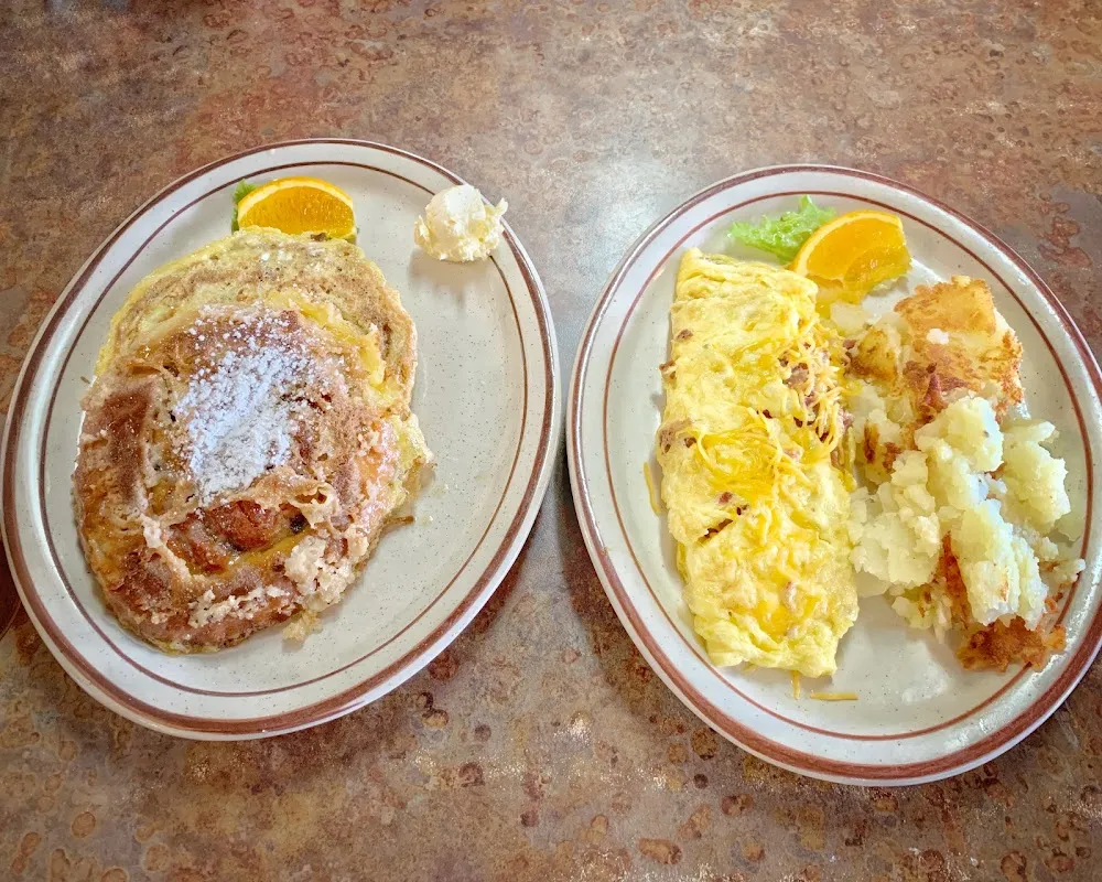 Cinnamon Roll French Toast and Bacon and Cheese Omelette